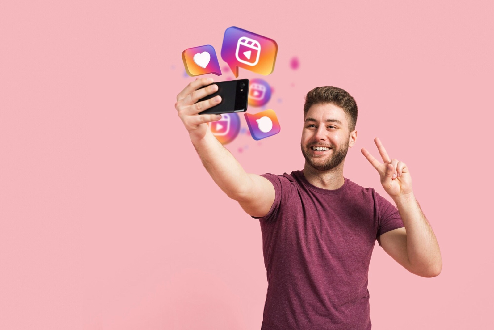 Creator taking a selfie with reaction icons around the phone