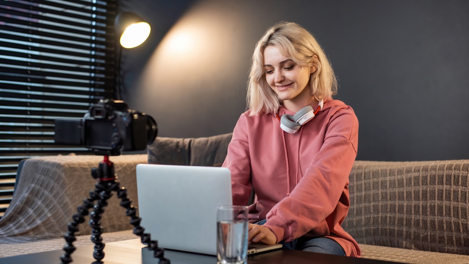 Creator managing Instagram comments and replies on a laptop