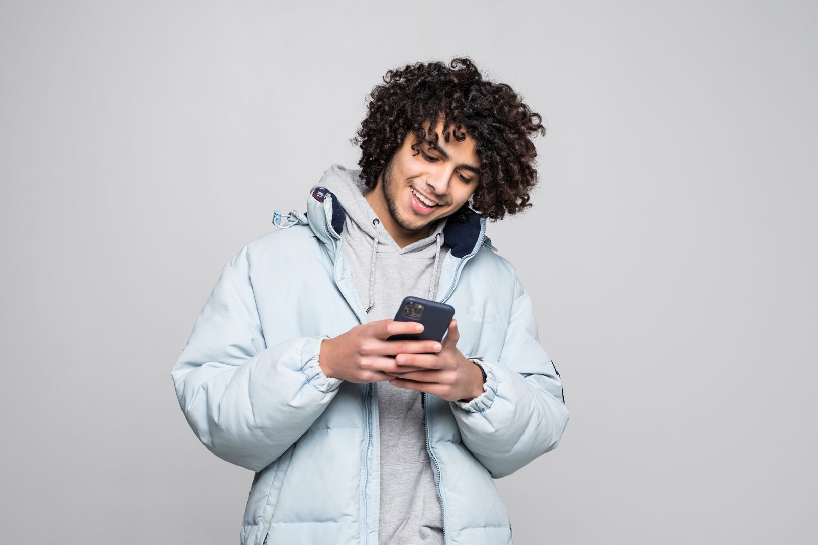 Creator checking Instagram comments on a phone